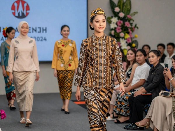 Elegant showcase of Malaysian traditional fashion featuring batik patterns, baju kurung, and diverse cultural attire representing Malaysia's multicultural heritage